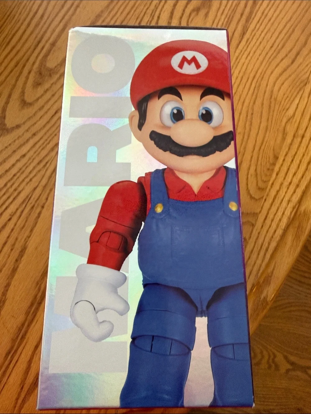 Nintendo Mario Figure with Red Hat, Blue Overalls and Yellow Luma
